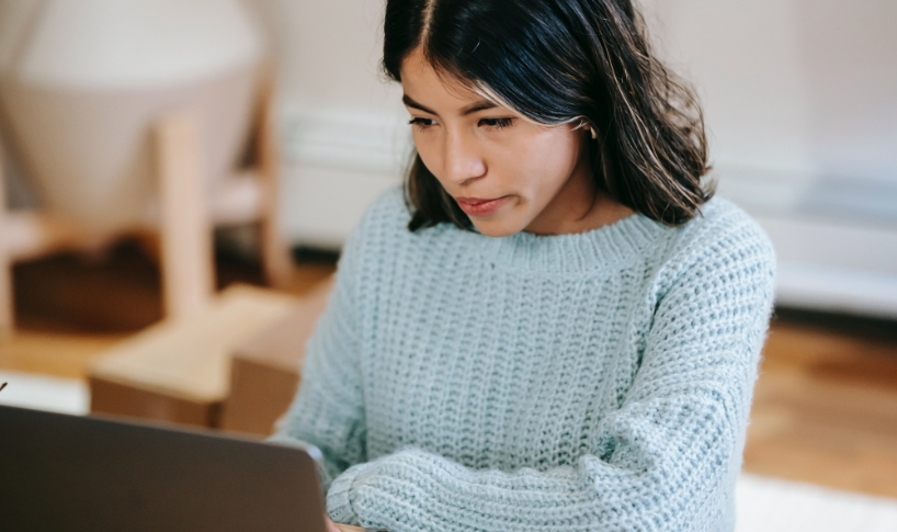 Woman Seriously Looking at the Screen | Medical Imaging Specialists | FMIG