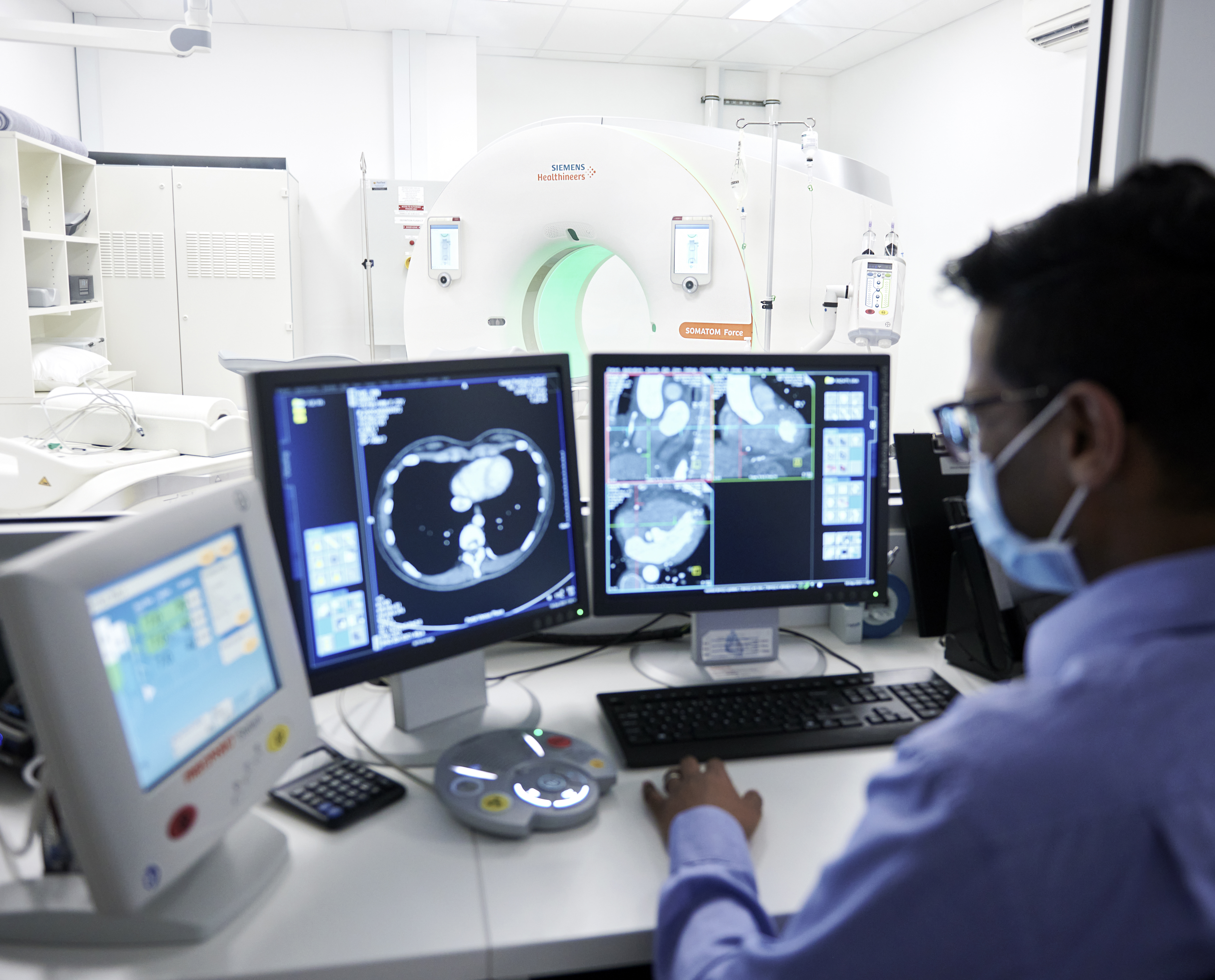 Man Staring at Computer Screen | MRI Specialist| FMIG