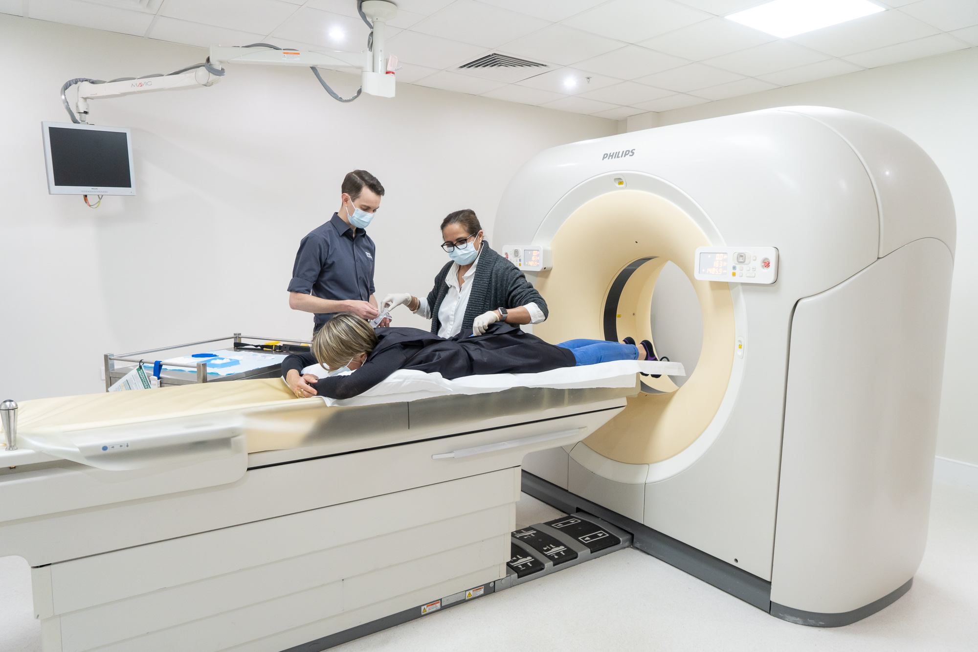 Two Doctors Preparing Female Patient For MRI Exam | Imaging CT Scan Near Me | Direct Radiology