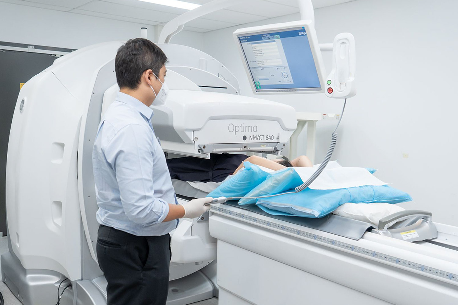 Woman Undergoing CT Scan Procedure | Nuclear Medicine | FMIG
