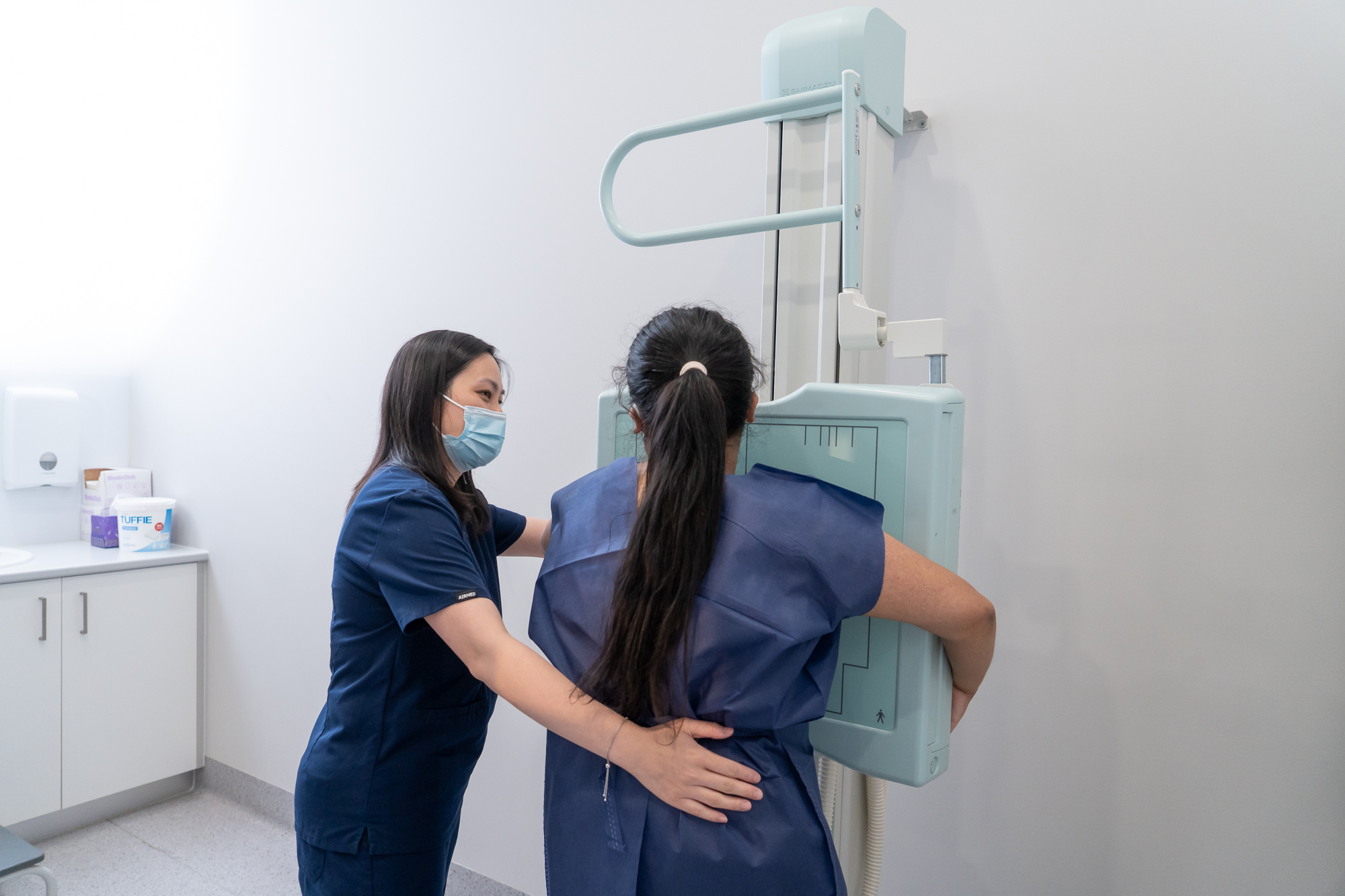Woman Undergoing Chest X Ray Procedure | X Ray | FMIG
